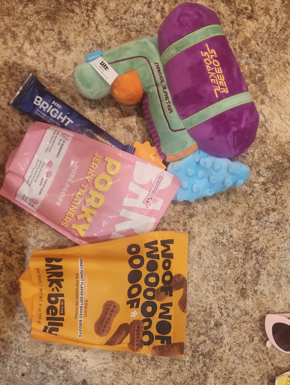 Dog Toy, 2 Bags Of Treats And A Dental Chew